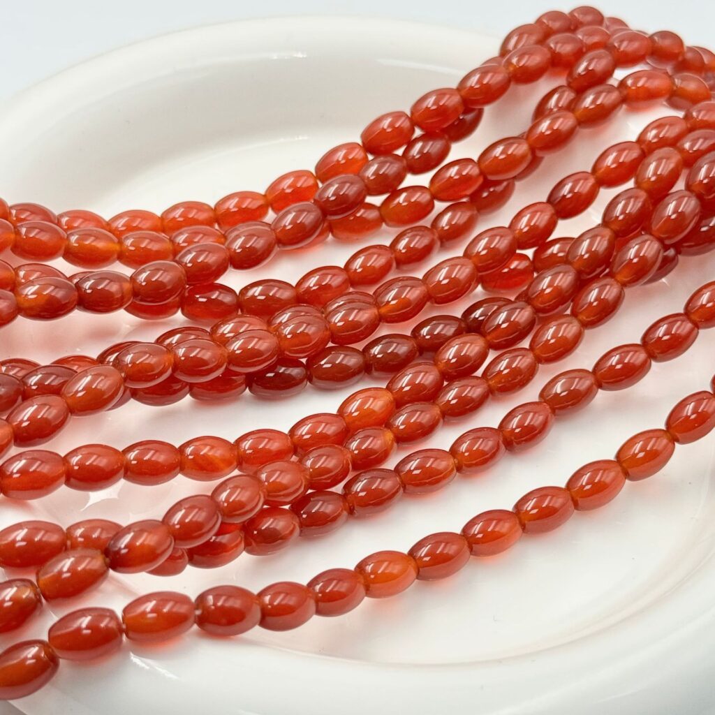 Red agate rice bead strands