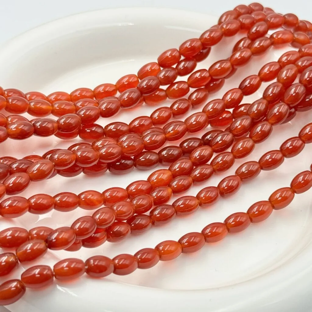 Red agate rice bead strands