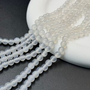 White chalcedony round bead strands